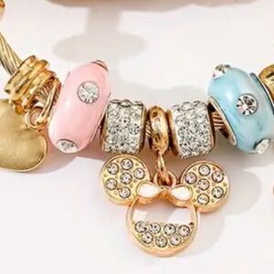 Gold and Pink Charm Bracelet